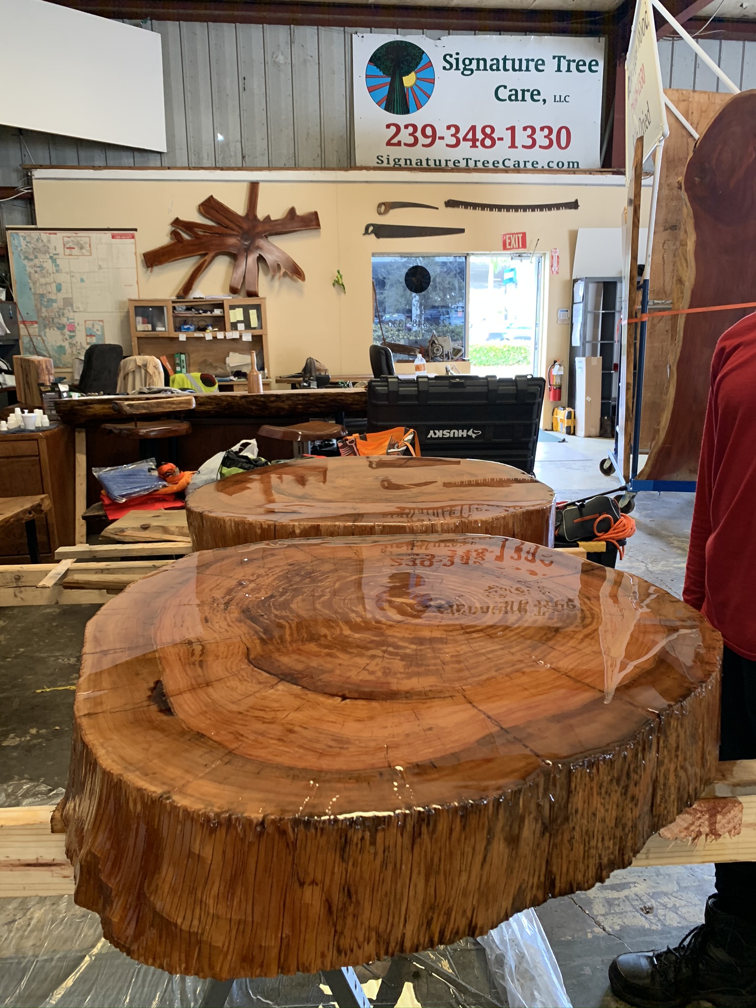 Live edge wood tables in Naples, Florida by Signature Tree Care